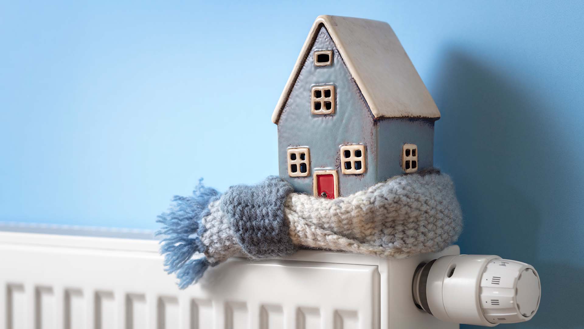homecare plans model house with scarf on radiator